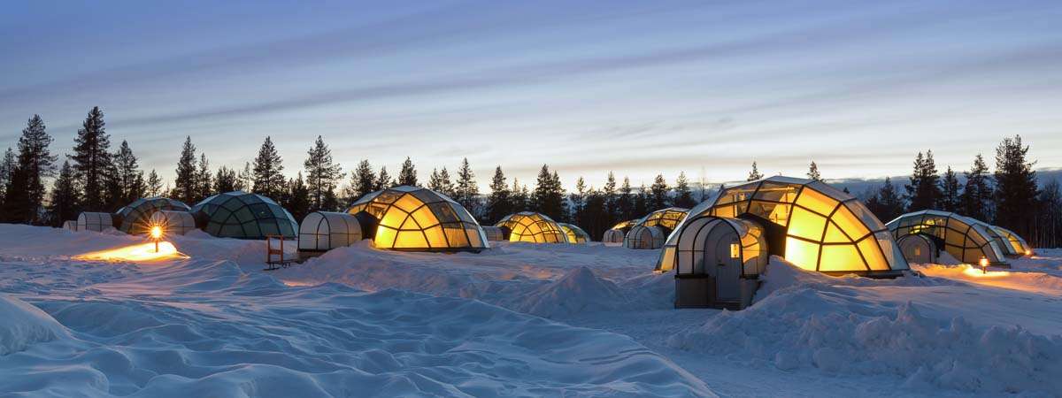 Chasing the Northern Lights From a Glass Igloo